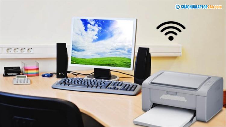 Khởi động laptop và máy in